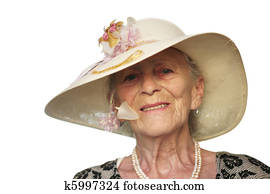 Portrait of a senior woman in retro hat, isolated on white. Portrait of a senior woman in retro hat, isolated on white.