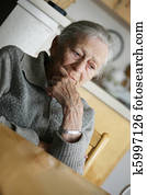 Portrait of a senior woman indoors. Portrait of a senior woman indoors.