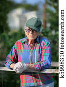 Portrait of senior woman in garden Portrait of senior woman in garden