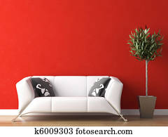 interior design of white couch on red wall