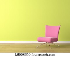 pink chair on green wall