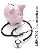 Piggy bank and stethoscope Piggy bank and stethoscope