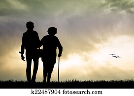 elderly couple, na, západ slnka