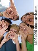group of happy teens at summer camp group of happy teens at summer camp