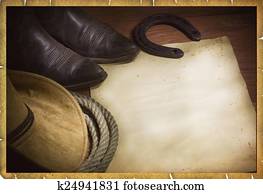 Rodeo cowboy background with western hat and lasso Rodeo cowboy background with western hat and lasso