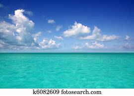 Caribbean sea horizon on blue sky vacation day