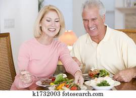 Elderly Couple Enjoying Healthy meal,mealtime Together Elderly Couple Enjoying Healthy meal,mealtime Together