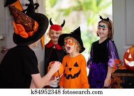 Kids trick or treat. Halloween. Child at door. Kids trick or treat. Halloween. Child at door.