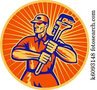 plumber holding a monkey wrench plumber holding a monkey wrench