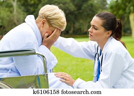 female doctor comforting patient