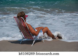 Healthy, Mature Woman Relaxing on a Florida Beach