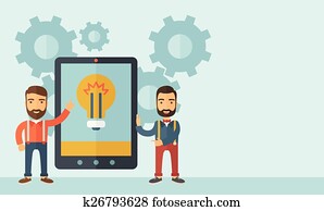 Two men holding a big screen tablet. Two men holding a big screen tablet.