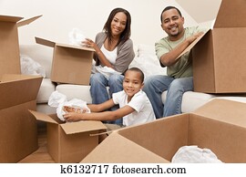 African American Family Unpacking Boxes Moving House African American Family Unpacking Boxes Moving House