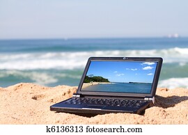 laptop on beach laptop on beach