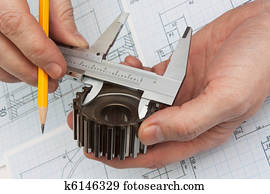 Slide rule in hand Stock Image | k5522771 | Fotosearch