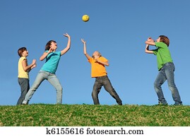 active kids playing ball at summer camp active kids playing ball at summer camp