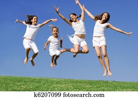 happy girls jumping at summer camp happy girls jumping at summer camp