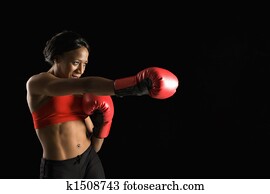 Woman boxing.