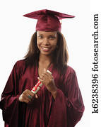 female college graduate in cap and gown