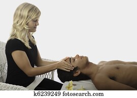 healing touch of a masseuse's hands healing touch of a masseuse's hands