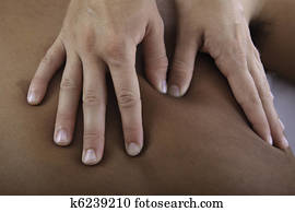 healing touch of a masseus's hands healing touch of a masseus's hands