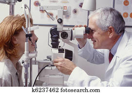 optometrist, com, paciente, dar, exame olho