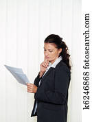 Businesswoman reading a letter