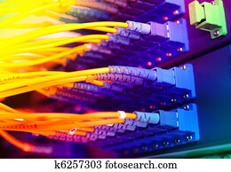 shot of network cables and servers in a technology data center 