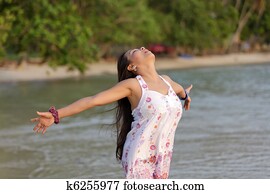 woman breathing on beach woman breathing on beach