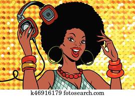 African American woman DJ with headphones African American woman DJ with headphones