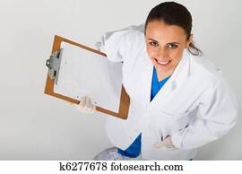 young medical intern with clipboard
