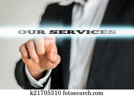 Businessman Pointing to Our Services Sign Businessman Pointing to Our Services Sign