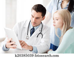 doctor and nurse with patient in hospital