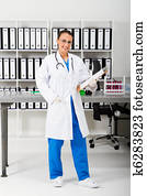 female medical examiner in lab