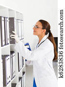 medical intern searching files medical intern searching files