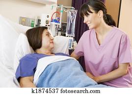 Nurse Talking To Patient