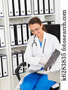 young nurse browsing files