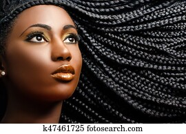 African female beauty with braided hair. African female beauty with braided hair.
