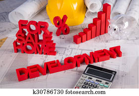 House under construction, blueprints concept House under construction, blueprints concept