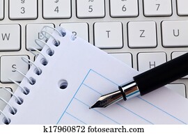 note pad and keyboard of a computer