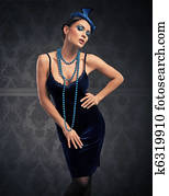 Vogue style vintage portrait in the dim light