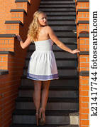 Coquettish young beautiful woman Coquettish young beautiful woman