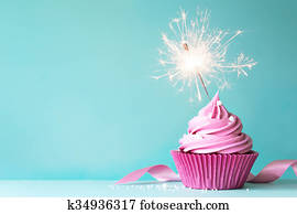 Pink cupcake with sparkler Pink cupcake with sparkler