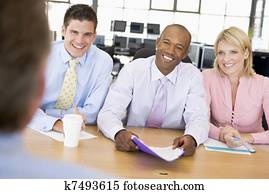 Stock Traders Conducting Interview
