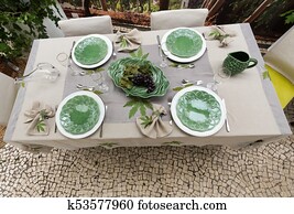Tasteful and sophisticated prepared table awaits the arrival of guests Tasteful and sophisticated prepared table awaits the arrival of guests