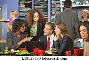 Serious People Talking in Cafe