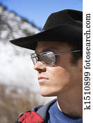 Man wearing cowboy hat.