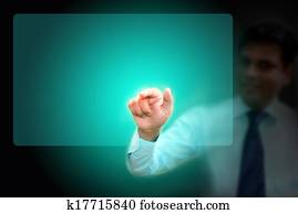 virtual empty screen touch by business man;