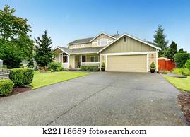House exterior with garage and driveway