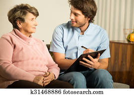 Doctor working in nursing home